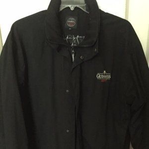 Black Men's XXL Official Guinness Coat with hidden hood, zipper and snap closure